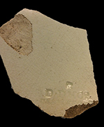 Creamware flat vessel, probably plate, with impressed mark “D D & Co.”.  David Dunderdale & Company, 1970-1821.
